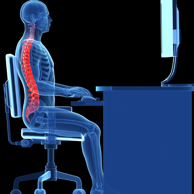 Correct position sitting at a desk