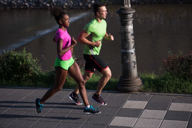 Two runners focusing on their technique.