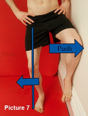 Wall gluteus medius exercise